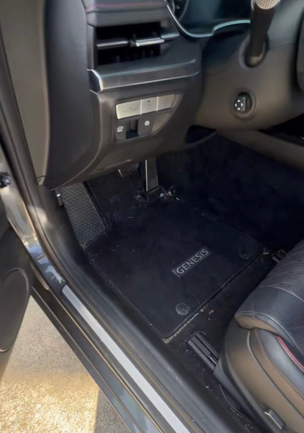 Genesis interior floor mat before mobile detailing in Atlanta, GA