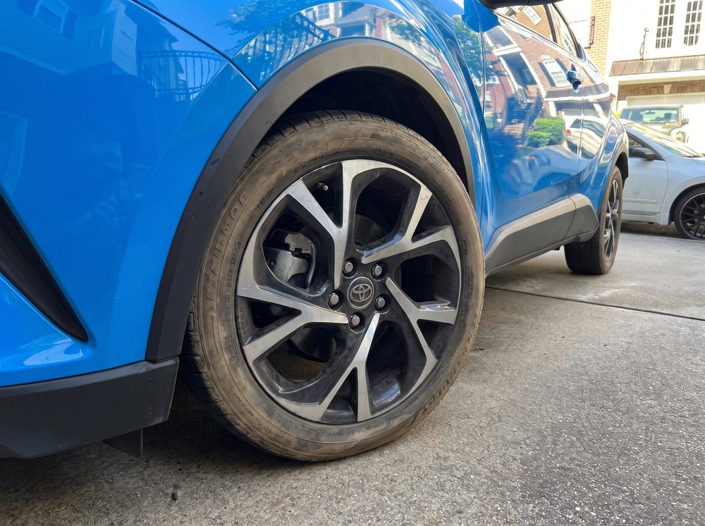 Dusty wheel and tire before mobile detailing in Atlanta, GA