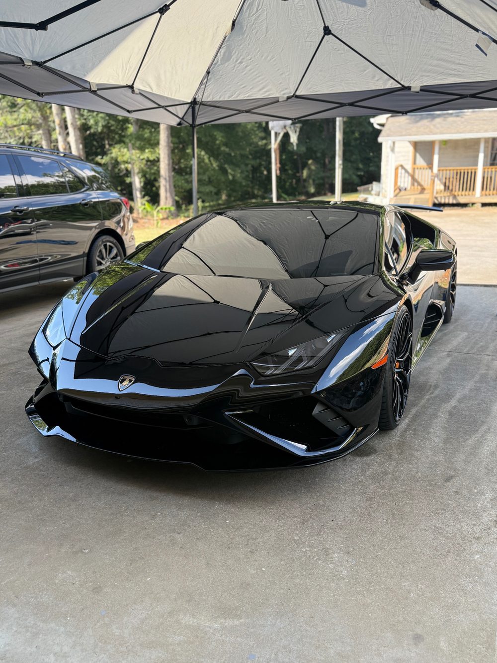 Mobile detailing setup on a Lamborghini Huracan on-site in Atlanta, GA