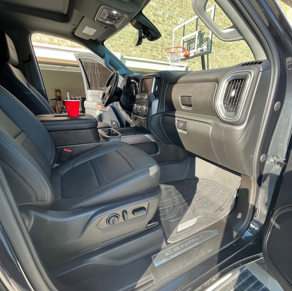 Detailed black leather GMC Denali interior in Atlanta, GA