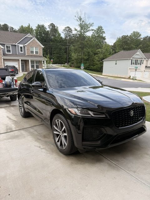 Tinted Jaguar F-Pace with mobile tint van on-site in Atlanta, GA