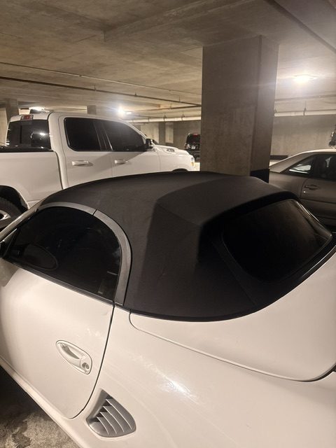 Tinted rear window on a white Porsche convertible, Atlanta, GA